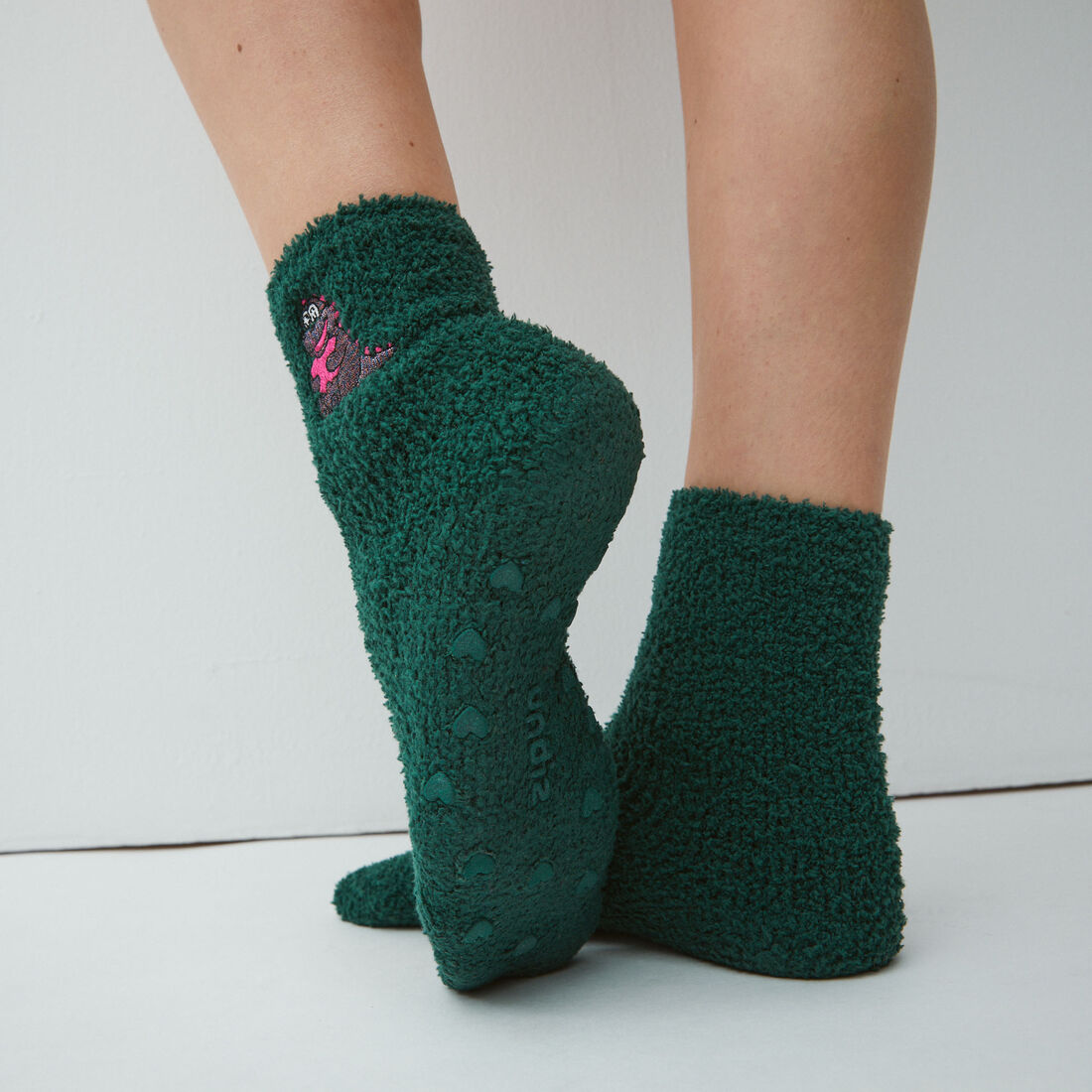 fluffy dinosaur print socks;