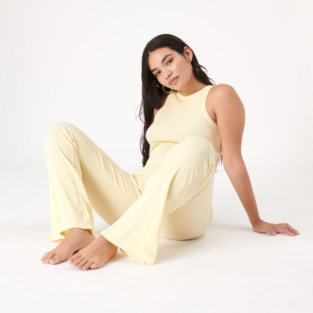 high-waisted flared trousers - pastel yellow;