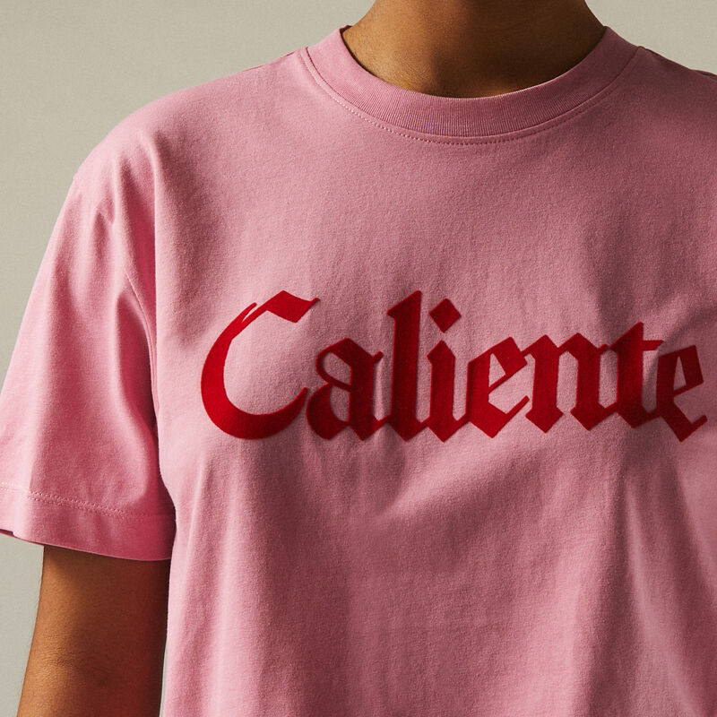 t-shirt with "caliente" print;