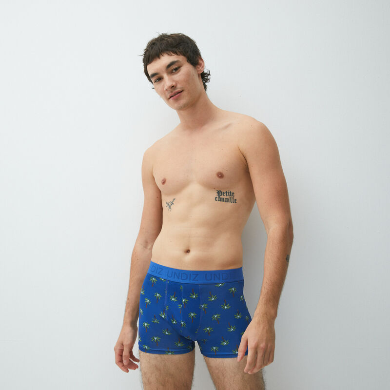 micro boxer shorts with palm trees pattern;
