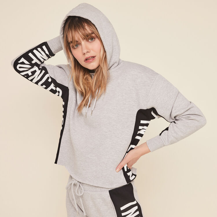 Hellovibiz sweatshirt with hood and bands on the side grey.