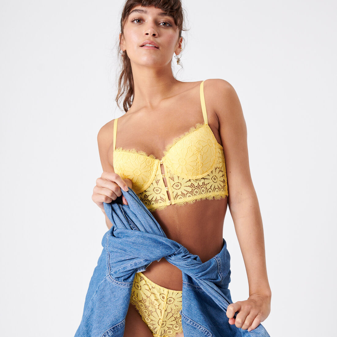 push-up bustier bra with gold buttons;