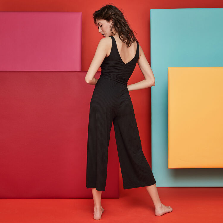 Newcroiseriz black jumpsuit black.