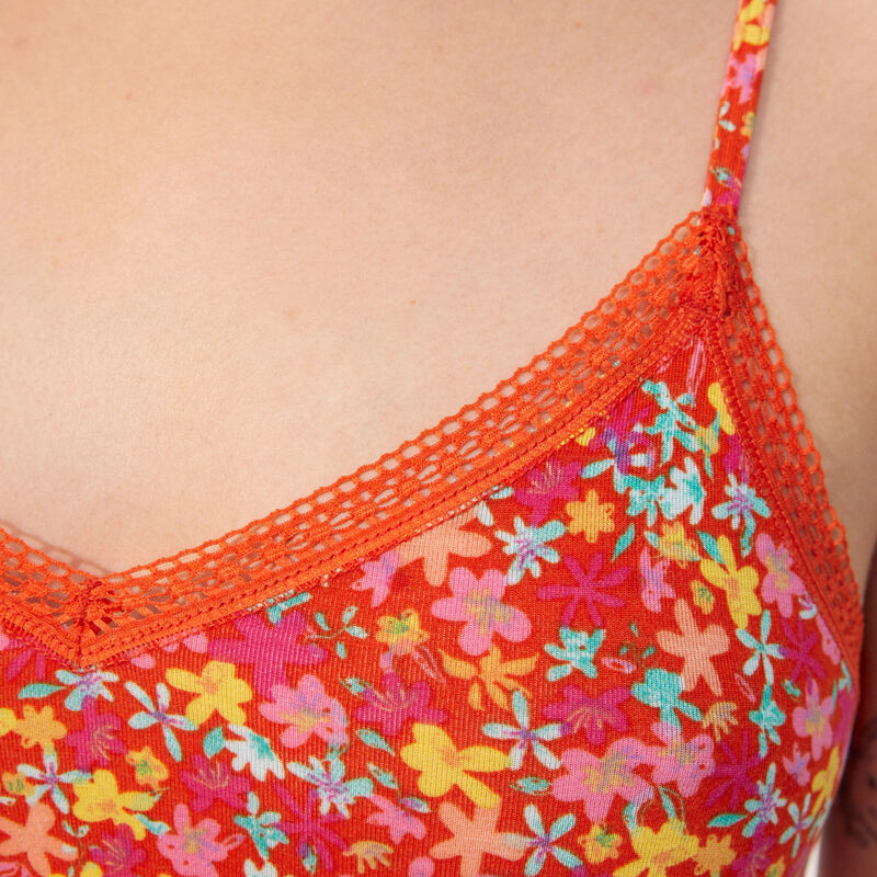 top à bretelles et motif floral ;