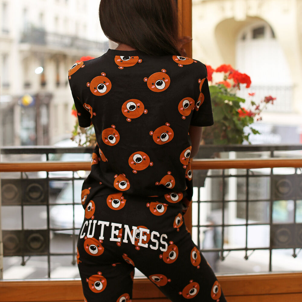 Bear leggings with cuteness slogan - black black.