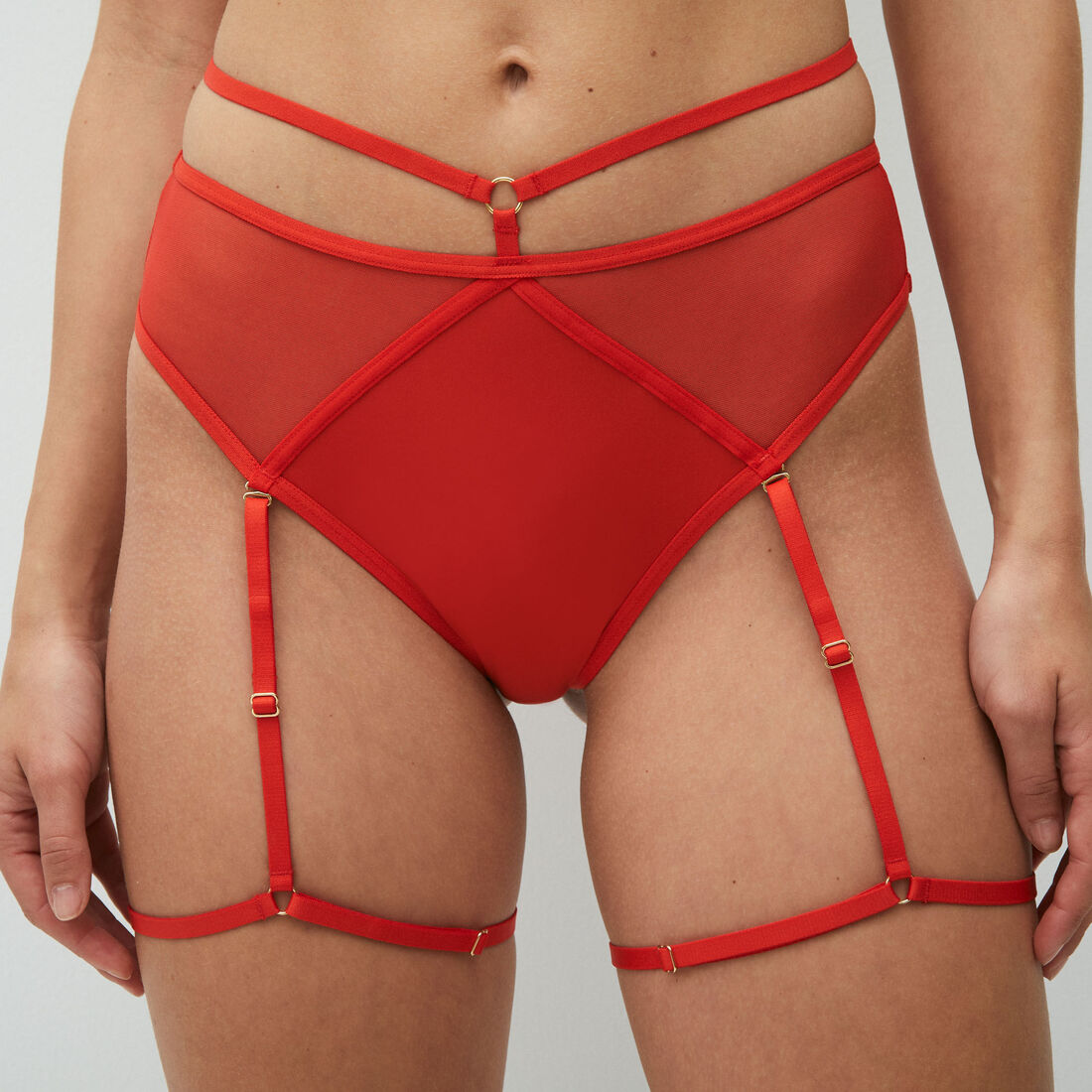 high-waisted tanga briefs in recycled micro-mesh and suspender belt;