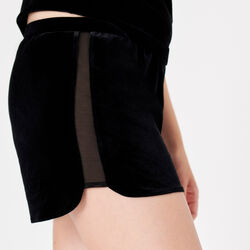 velvet and fishnet shorts;