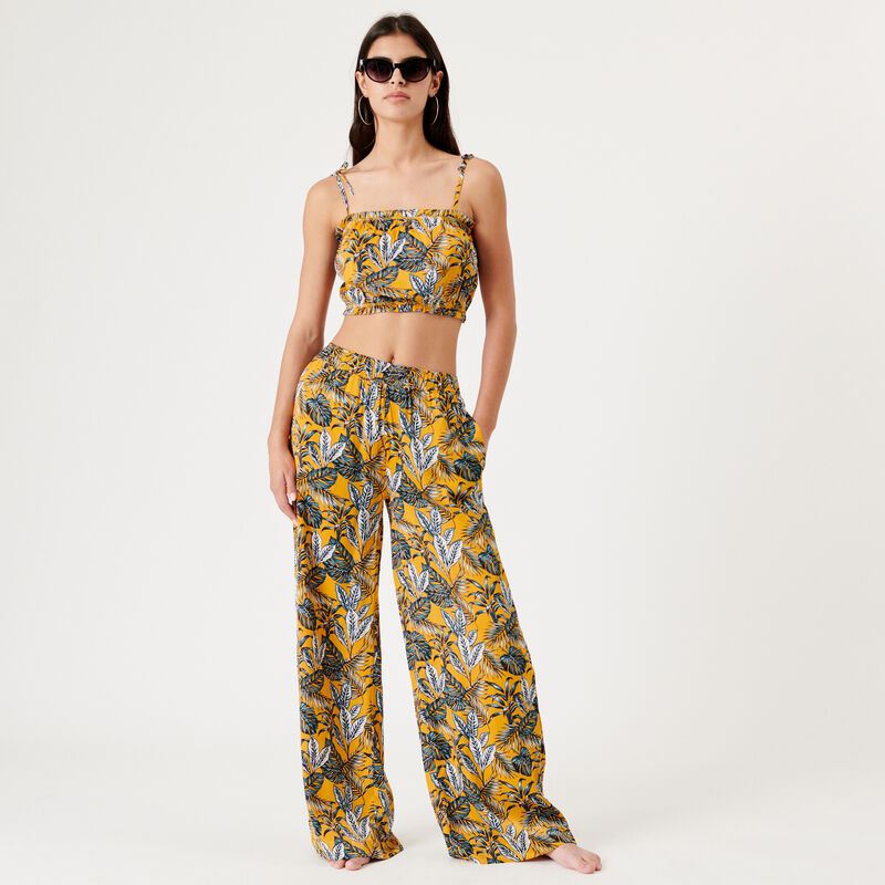 relaxed fit tropical print trousers;
